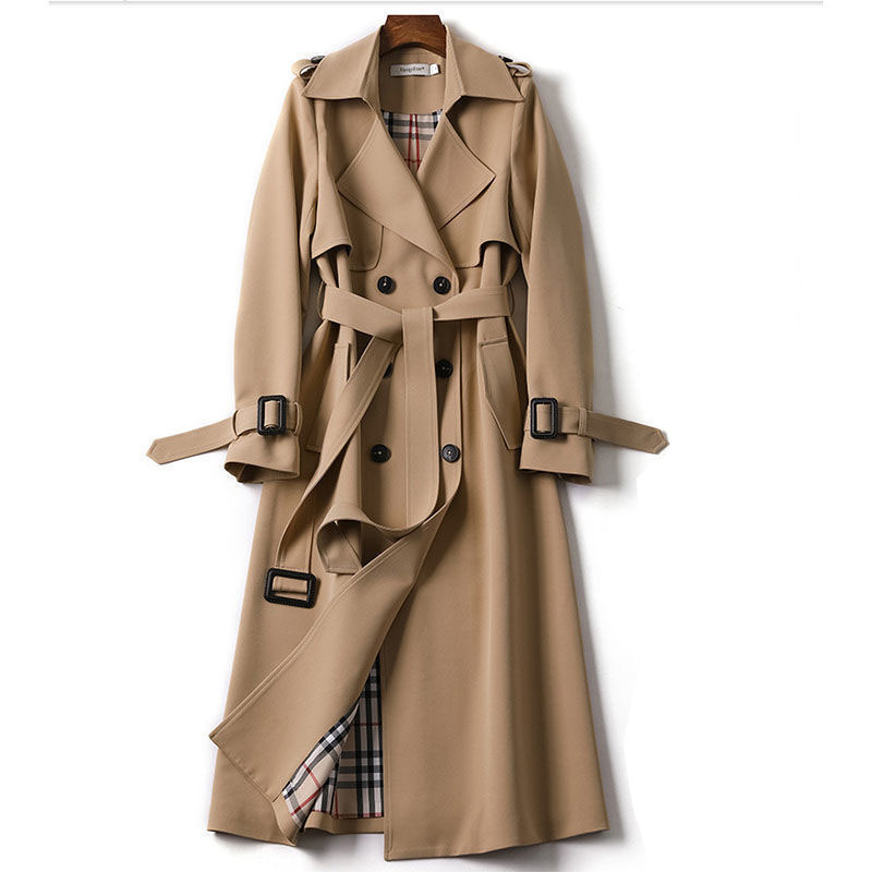 Khaki double-breasted long trench coat with a storm flap, epaulettes, buckled cuff straps and a tie belt